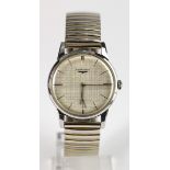 Gents stainless steel cased Longines manual wind wristwatch. The silver brush effect dial with baton