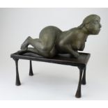 Bronze modernist studio sculpture of a figure. On a plinth base. Measures approx 35cm in length.