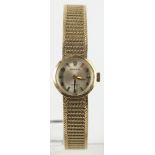 Ladies 9ct gold manual wind Rolex Precision wristwatch on a 9ct integral bracelet (with reciept
