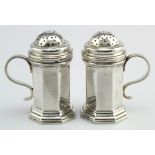 Matching pair of silver bun casters/pepper pots - all have matching hallmarks for C&RC London, 1923.