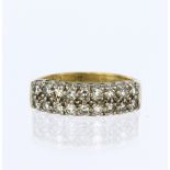 18ct yellow gold two row half eternity ring set with eighteen round brilliant cut diamonds