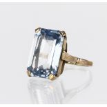 9ct yellow gold dress ring set with a rectangular blue paste measuring approx. 18mm x 13mm, finger