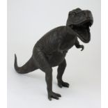 Bronze figure of a T-Rex. Height measures approx 27cm.