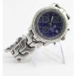 Gents stainless steel cased Tag Heuer automatic chronograph wristwatch. The round blue dial with