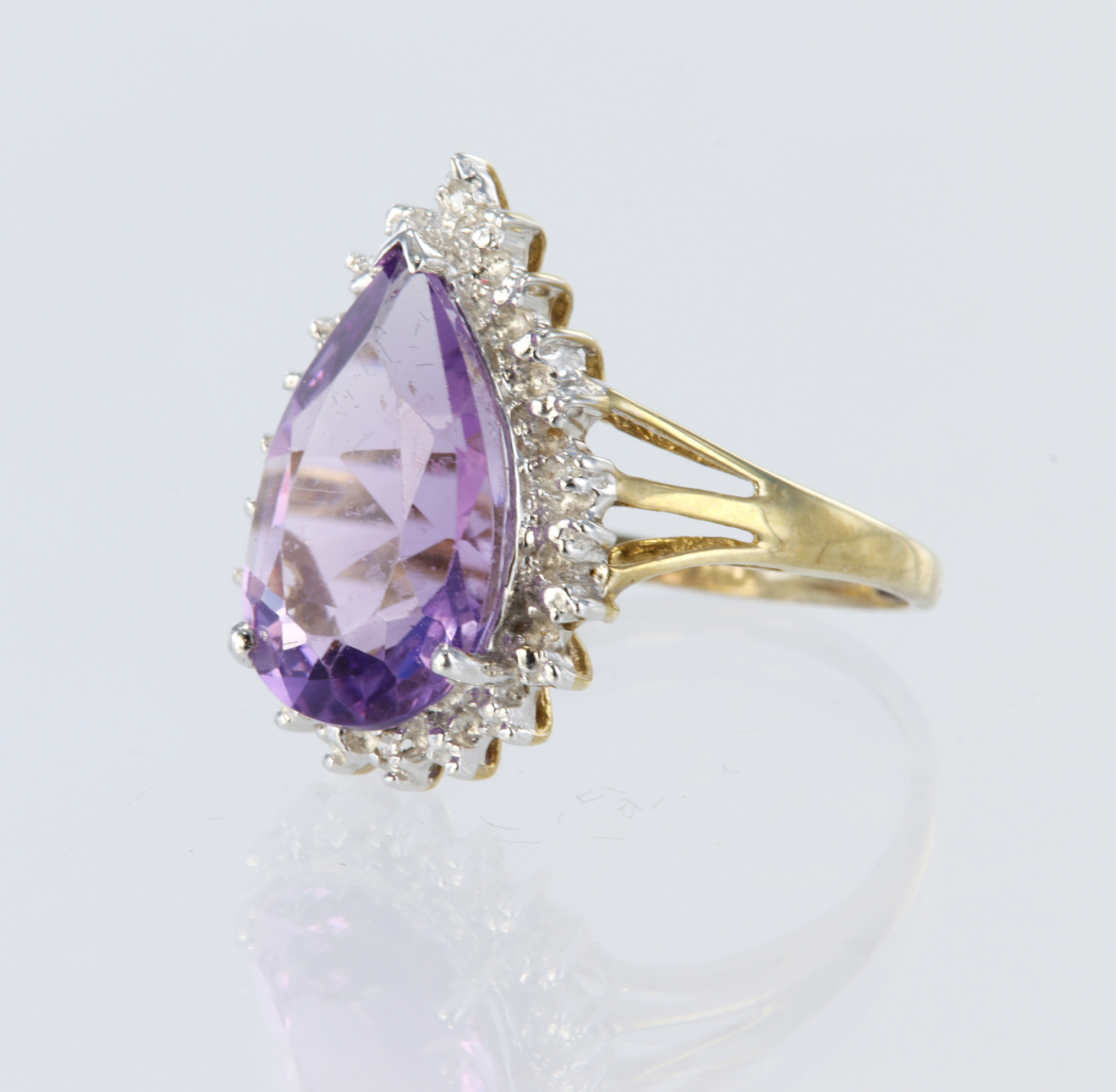 9ct yellow gold cluster dress ring set with a central pear shaped amethyst measuring approx. 14mm - Image 2 of 2