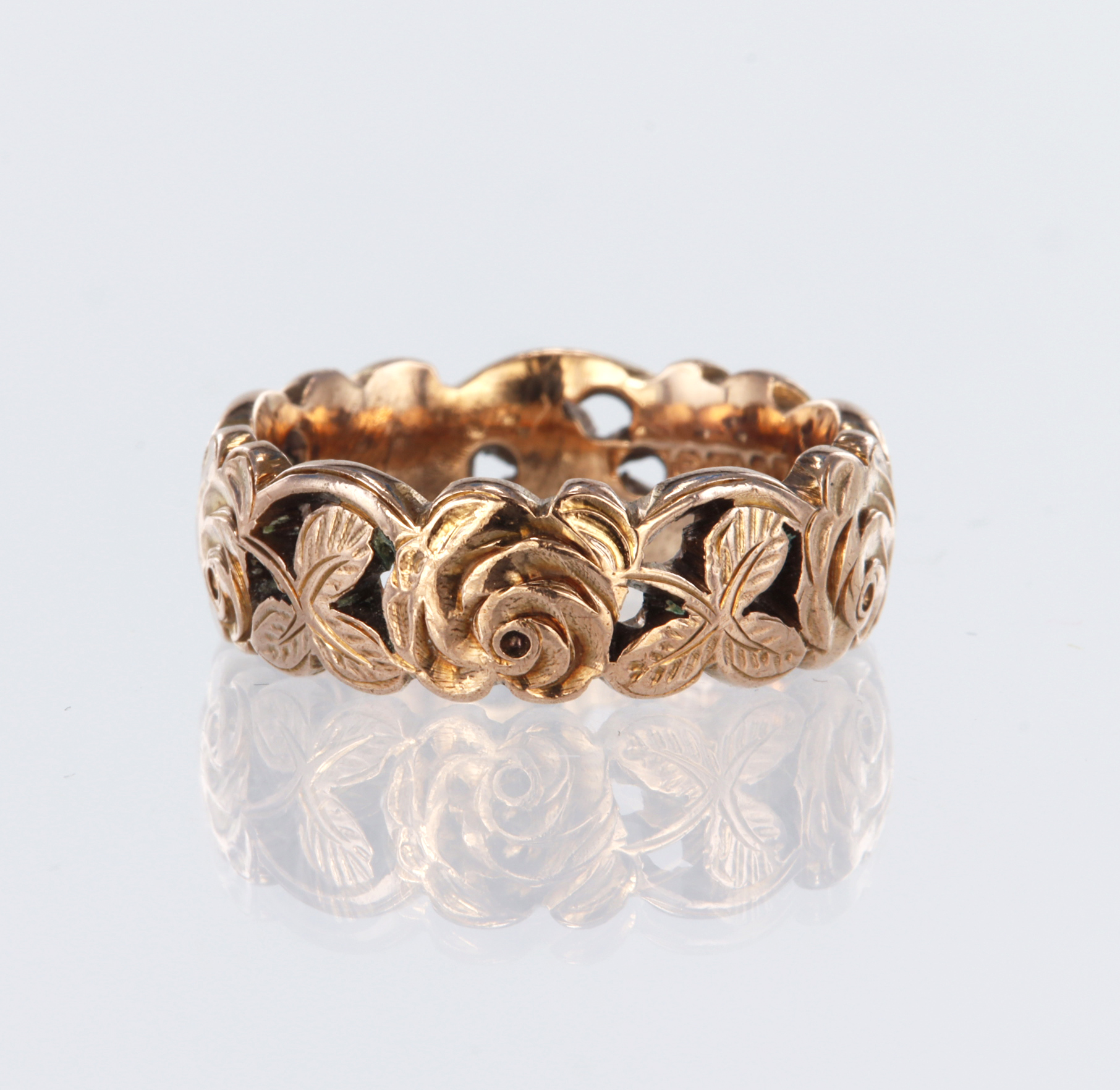 9ct rose gold 7mm wide band ring decorated with floral and foliate design, finger size O, weight 7.