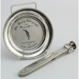 Silver cigar cutter, hallmarked London 1901, approx 87g along with a silver ashtray embossed with "