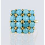 18ct yellow gold ring set with sixteen round turquoise cabochons measuring approx. 4mm diameter, all