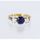 18ct yellow gold ring featuring a cushion cut sapphire measuring approx. 6mm x 6mm in a ten claw