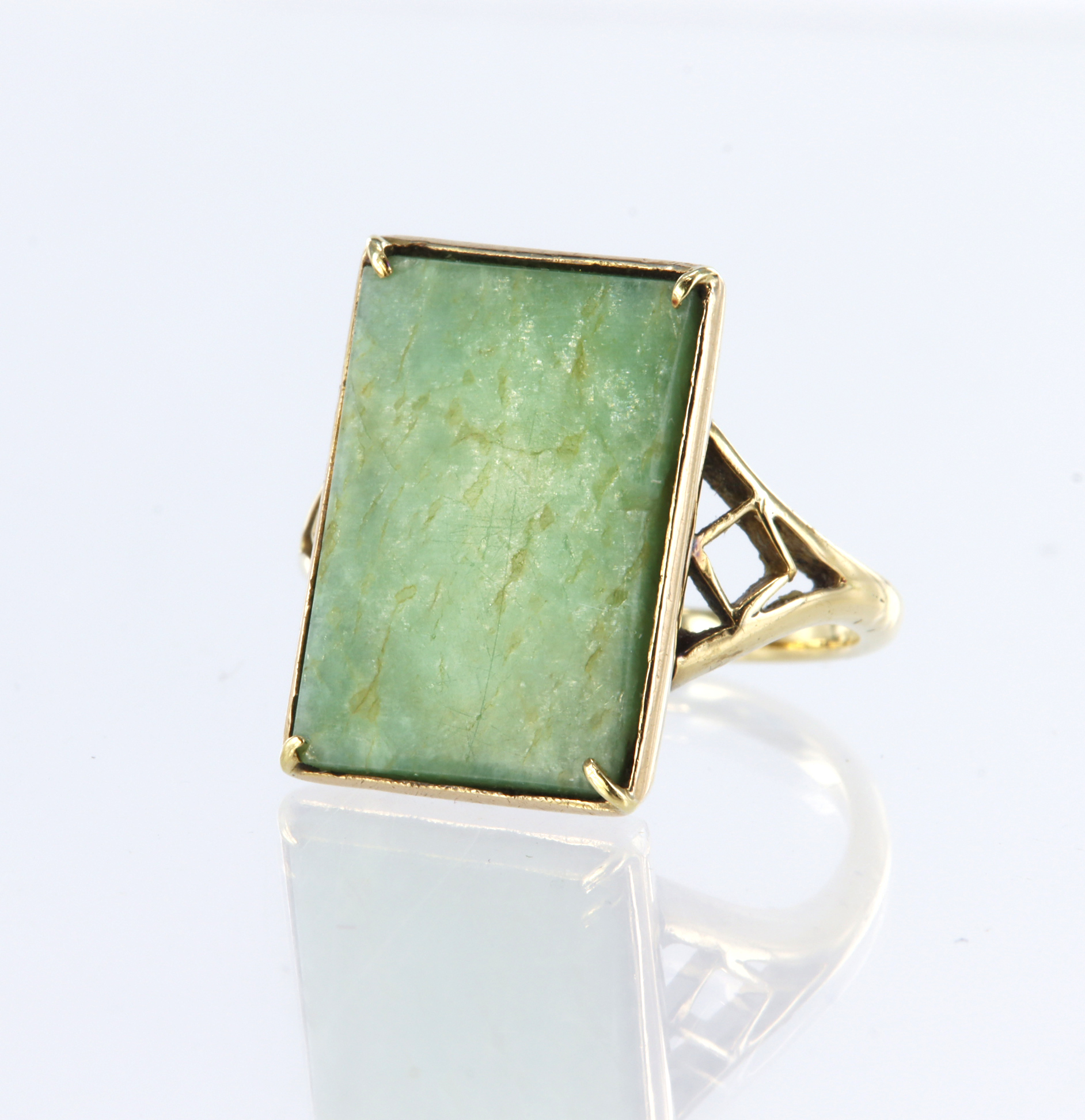18ct yellow gold dress ring set with a rectangular green hardstone measuring approx. 19mm x 13mm, in