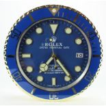 Advertising Wall Clock. Blue/gold 'Rolex' advertising wall clock, blue dial reads 'Rolex Oyster