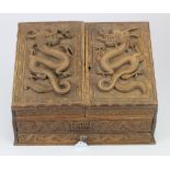 Carved wood stationary box, with Chinese dragon design, height 26cm, width 36.5cm, depth 20cm