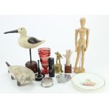 Collectables. A collection of various items, including ring holders (one in the shape of a hand), AA