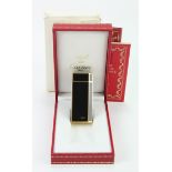Cartier. Must de Cartier black lacquered lighter, in original case & outer packaging