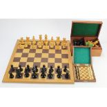 Chess interest. Two complete sets of Staunton style chess pieces, together with a cased Chess set by