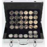 GB £5 Coins (34 plus 2 crowns) housed in an aluminium carry case, comprised of 4x sealed