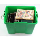 Giant green plastic crate packed with various collections in albums etc, better British Commonwealth