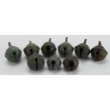 Artefacts: A collection of 9x crotal bells.