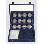 World proof and commemorative coins (21) mostly silver, 1990s, in a Westminster case (World at War