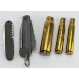 Penknives an RN type, a German type and some shell cases