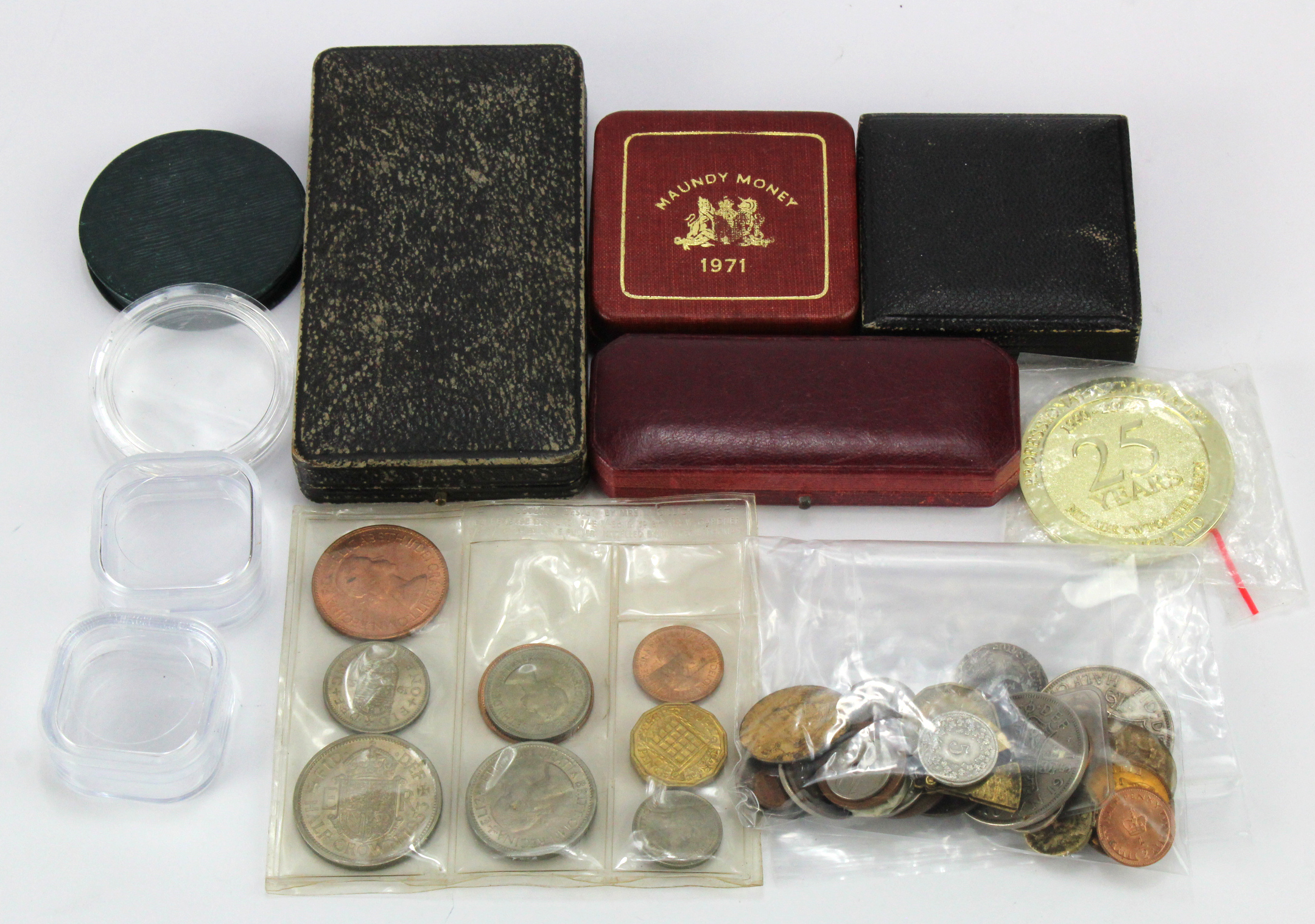 Coins, tokens, medals, boxes etc, an assortment, noted a couple of maundy set cases, a Charles I