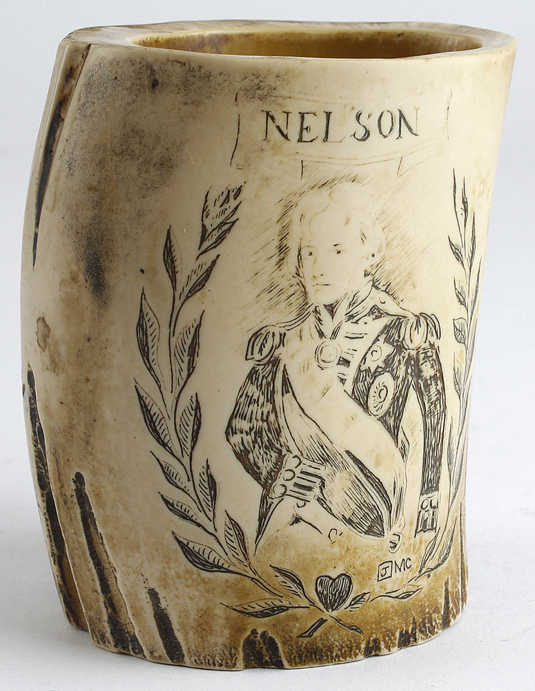 Nelson interest a leg bone or Antler part superbly etched with Nelson and Victory images