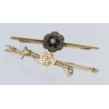 Two 9ct Gold bar Brooches one set with Garnets and Pearl and one Riding Crop weight 6.9g