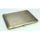 Sterling silver cigarette case with gilded interior and engine turned decoration, measuring