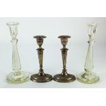 Candlesticks. Two pairs of candlesticks, comprising a cut faceted glass pair & a silver hallmarked