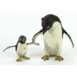 Cold painted bronzes. Two cold painted bronzes depicting penguins, height 70mm & 38mm approx.