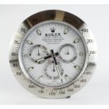 Advertising Wall Clock. Chrome 'Rolex' style advertising wall clock, chrome dial reads 'Rolex Oyster