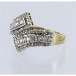 9ct yellow and white gold crossover style ring set with thirty baguette cut diamonds and fifty