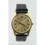 Gents gold plated Longines "Conquest" automatic wristwatch. The cream dial with gilt markers along