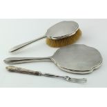 Silver mounted dressing table mirror & hairbrush; silver hallmarked for W&H Chester, 1941 and a