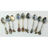 Silver enamel spoons. A group of nine mostly continental silver & enamel souvenir teaspoons,