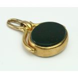 18ct Gold swivel fob with contrasting stone to either side, hallmarks rubbed, length 32mm approx.,