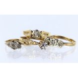 Four diamond rings to include a 9ct yellow gold diamond set solitaire, finger size M/N. 9ct yellow