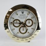 Advertising Wall Clock. Gold & white 'Rolex' style advertising wall clock, white dial reads 'Rolex
