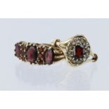 Two rings to include 9ct yellow gold boat shaped ring set with nine garnets, finger size Q. 9ct