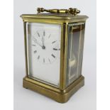 Brass chiming five glass carriage clock, white enamel dial with Roman numerals, height 14cm