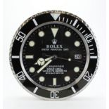 Advertising Wall Clock. Black 'Rolex' advertising wall clock, black dial reads 'Rolex Oyster