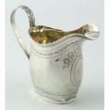 Chester silver small helmet shaped cream jug, has a few dents. Hallmarked GNRH Chester, 1908. Weighs