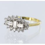 18ct yellow gold fancy cluster ring set with three baguette cut diamonds and fourteen round