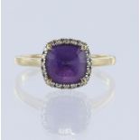 9ct yellow gold amethyst and diamond cluster ring, one cushion mixed cut amethyst measuring 8mm x