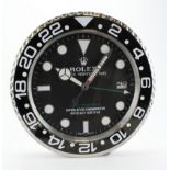 Advertising Wall Clock. Black & chrome 'Rolex' advertising wall clock, black dial reads 'Rolex