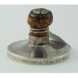 RMS Lancastria interest. A bottle cork mounted in a sterling silver base, edge reads 'R.M.S.