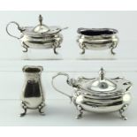 Three piece silver cruet set - mustard, salt & pepper (missing lid), includes two blue glass