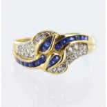 18ct yellow gold band ring featuring eighteen calibre cut sapphires in a channel setting, and twenty