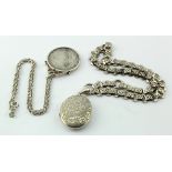 Victorian decorated silver locket hallmarked JR&S Birmingham, 1890 with a fancy linked unmarked