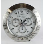 Advertising Wall Clock. Silver & white 'Rolex' style advertising wall clock, white dial reads 'Rolex